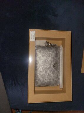 Coach Wristlet with Snowflake Charm